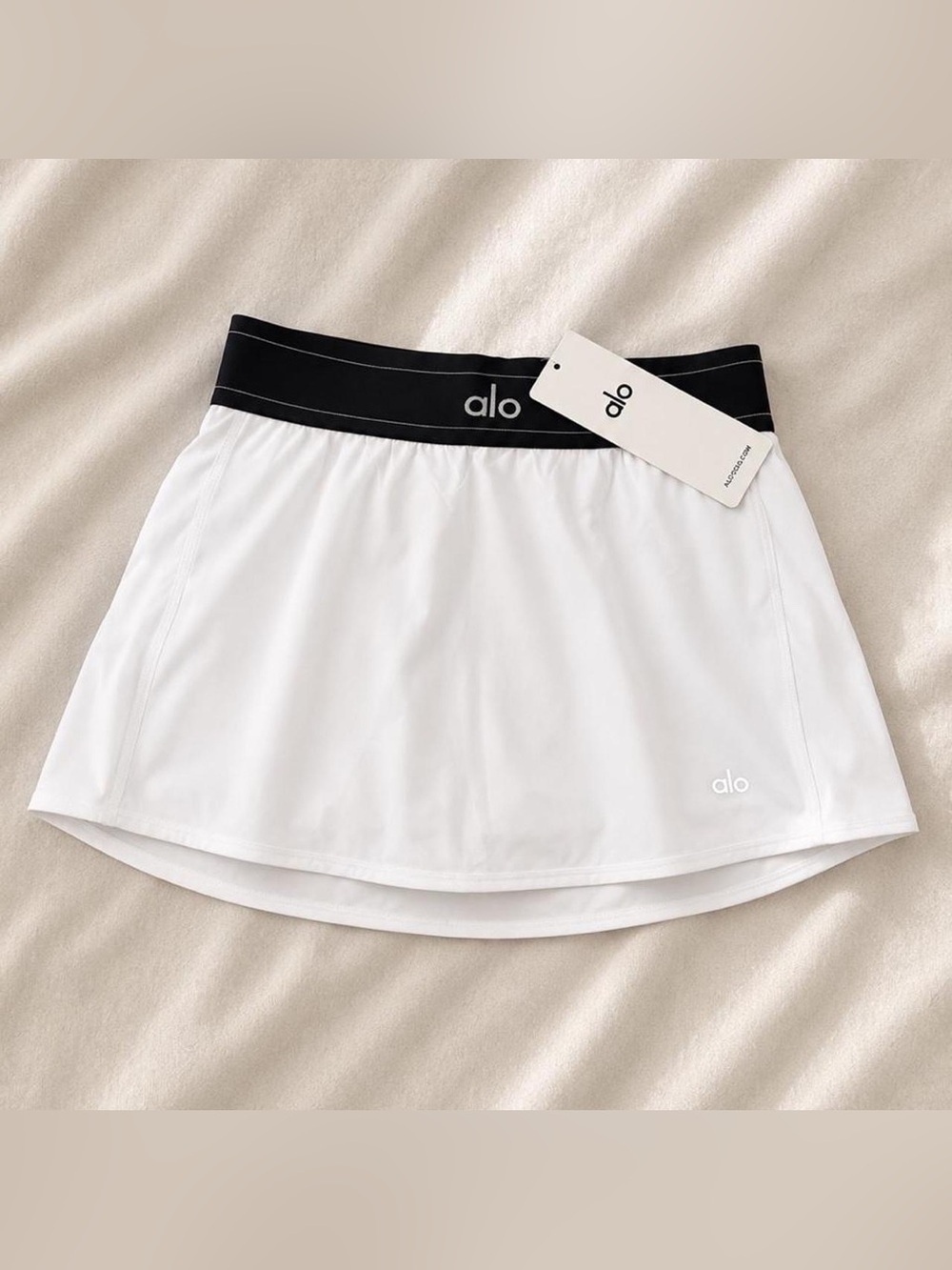 ALO Yoga White Mini Skort with Black Elastic Waistband